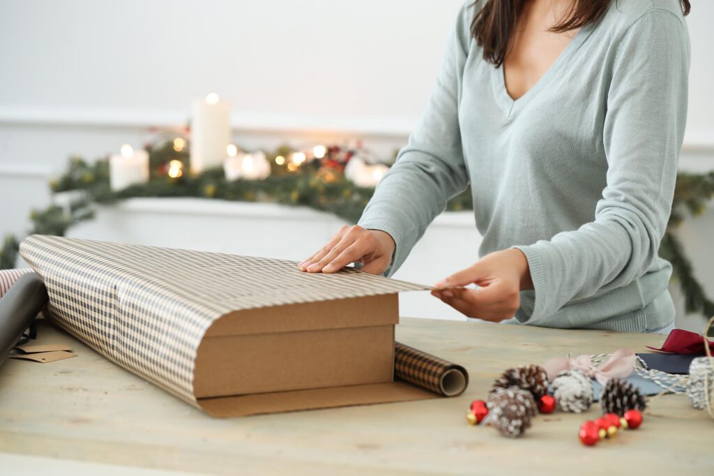 Holiday wrapping of a Folding Set-Up Apparel Box, Natural Kraft