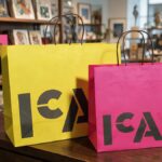 ICA Custom Midtown Paper Shoppers sitting on counter of the museum store