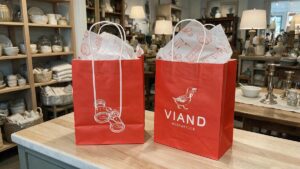 Viand Mercantile Custom Paper Shoppers sitting on the counter