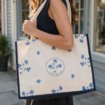 Cartolina Screen Printed Canvas Bag held by shopper